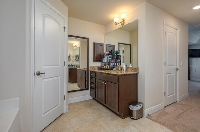 702 Country Walk Cv, Eagle Lake, FL 33839 - bathroom with vanity and a bathtub