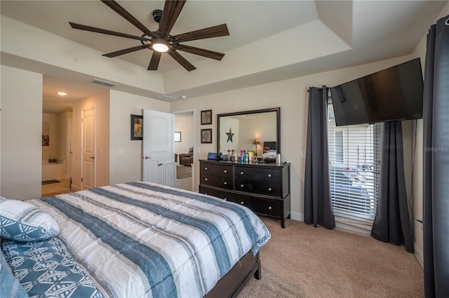 702 Country Walk Cv, Eagle Lake, FL 33839 - bedroom featuring light colored carpet, recessed lighting, ensuite bathroom, and a ceiling fan