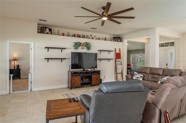 702 Country Walk Cv, Eagle Lake, FL 33839 - living room featuring a ceiling fan and baseboards