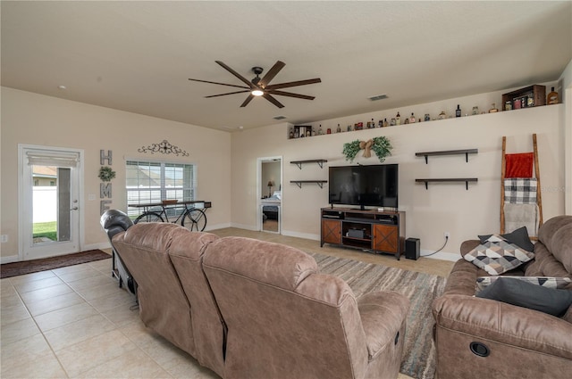 702 Country Walk Cv, Eagle Lake, FL 33839 - living room featuring a ceiling fan and light tile patterned flooring