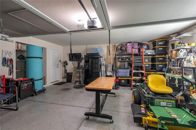 702 Country Walk Cv, Eagle Lake, FL 33839 - garage with a garage door opener