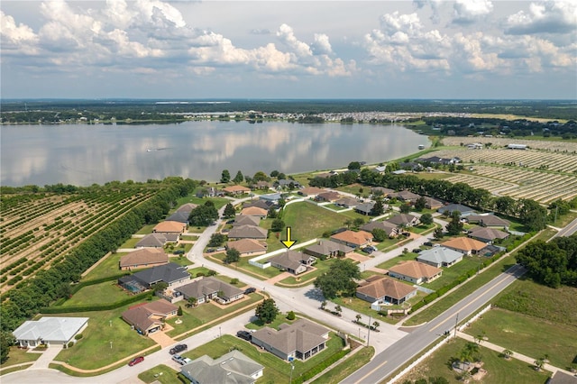 702 Country Walk Cv, Eagle Lake, FL 33839 - aerial view of property's location featuring a nearby body of water and nearby suburban area