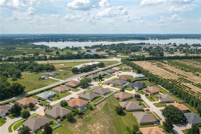 702 Country Walk Cv, Eagle Lake, FL 33839 - aerial perspective of suburban area featuring a large body of water
