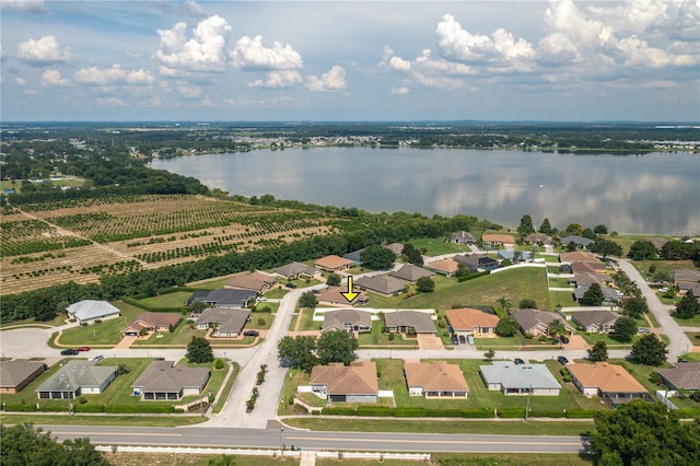 702 Country Walk Cv, Eagle Lake, FL 33839 - aerial view of residential area with a large body of water