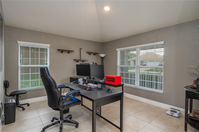 702 Country Walk Cv, Eagle Lake, FL 33839 - office area with plenty of natural light, light tile patterned flooring, and vaulted ceiling