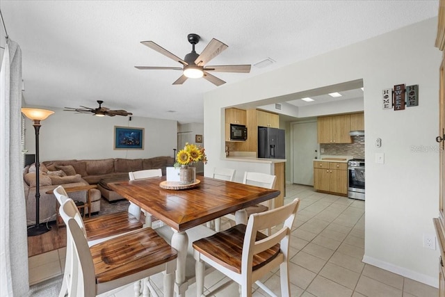 512 Hilldale Rd, Brandon, FL 33510 - dining room with light tile patterned flooring and ceiling fan