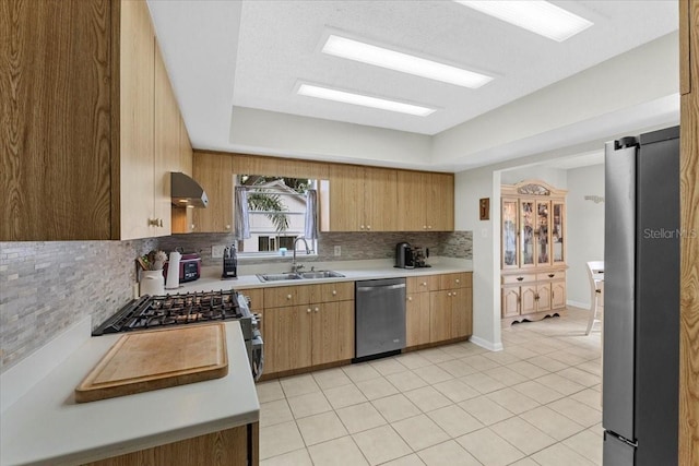 512 Hilldale Rd, Brandon, FL 33510 - kitchen featuring stainless steel appliances, ventilation hood, decorative backsplash, light countertops, and light tile patterned floors