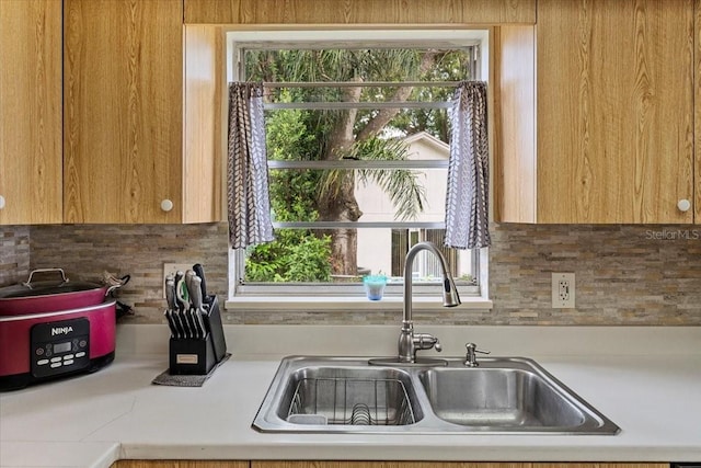512 Hilldale Rd, Brandon, FL 33510 - kitchen featuring light countertops and tasteful backsplash