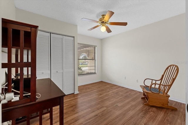 512 Hilldale Rd, Brandon, FL 33510 - unfurnished office featuring wood finished floors, ceiling fan, and a textured ceiling