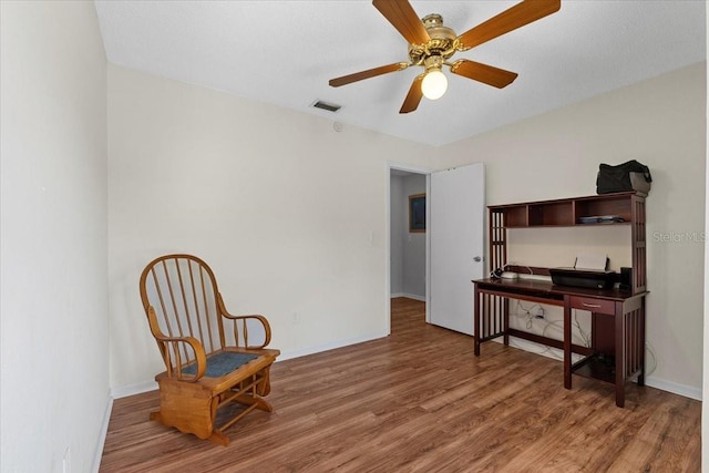 512 Hilldale Rd, Brandon, FL 33510 - sitting room with light wood-style floors and ceiling fan