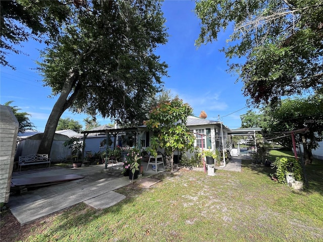 1319 Florida Ave, Saint Cloud, FL 34769 - view of grassy yard with a patio