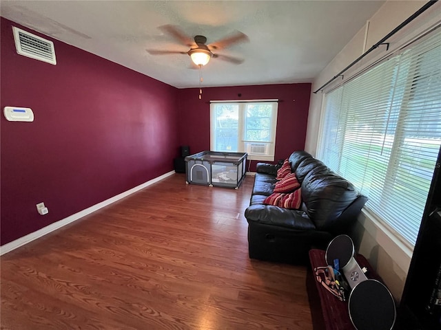 1319 Florida Ave, Saint Cloud, FL 34769 - living room with a ceiling fan and wood finished floors