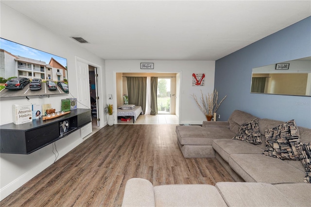 404 Country Ln NE Unit 404, Winter Haven, FL 33881 - living area with wood finished floors