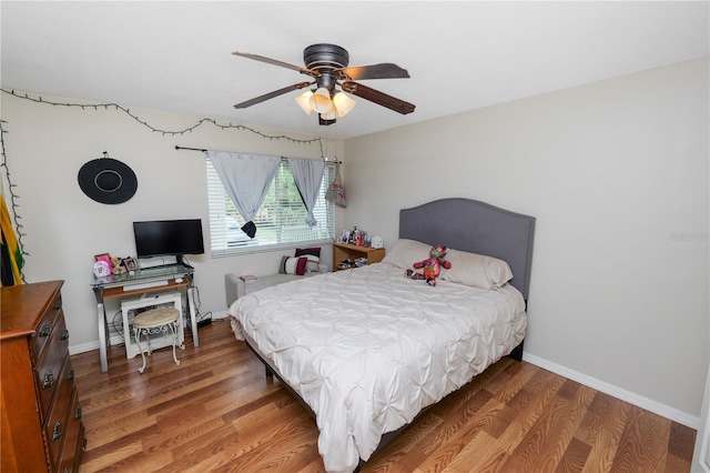 404 Country Ln NE Unit 404, Winter Haven, FL 33881 - bedroom featuring wood finished floors and ceiling fan