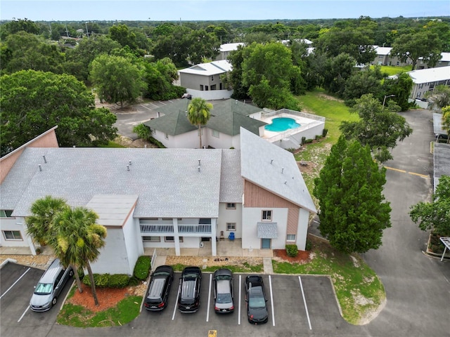 404 Country Ln NE Unit 404, Winter Haven, FL 33881 - aerial view of property and surrounding area featuring a pool