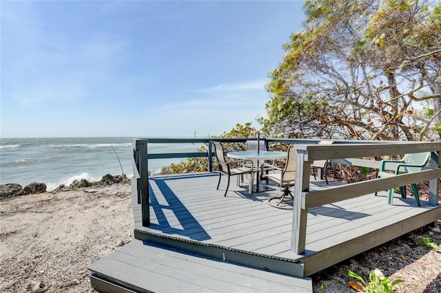 deck featuring a water view