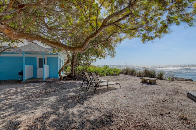 view of yard with a water view