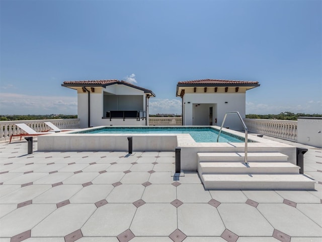 view of pool with a patio