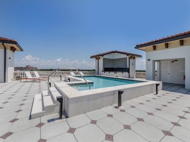 view of pool with a patio area