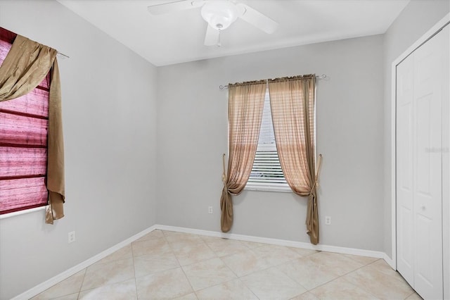 empty room featuring ceiling fan