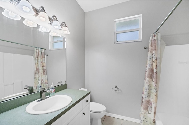 full bathroom with tile patterned floors, vanity, shower / tub combo, and toilet