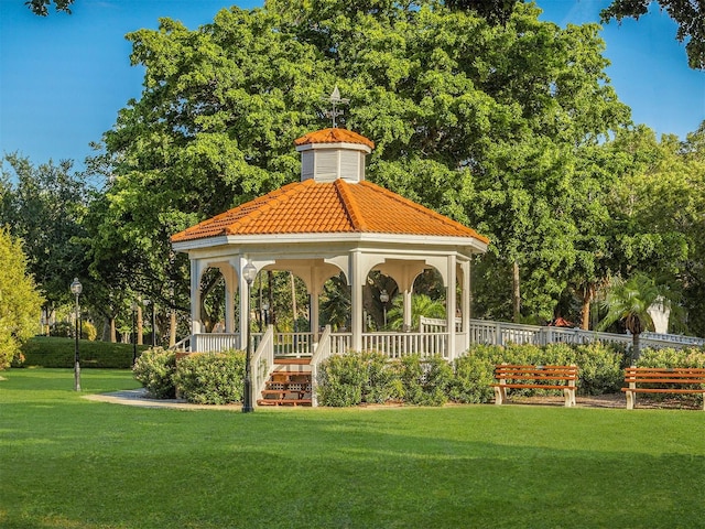 view of community featuring a lawn and a gazebo