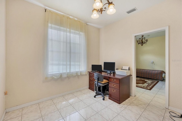 tiled home office featuring an inviting chandelier