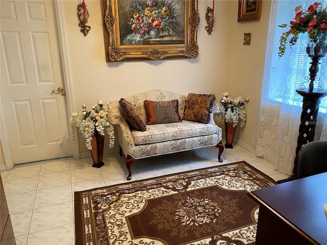 sitting room with light tile patterned flooring