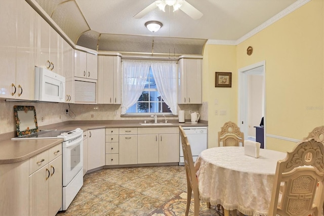 kitchen featuring ceiling fan, backsplash, sink, crown molding, and white appliances