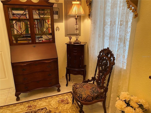 living area with tile patterned flooring