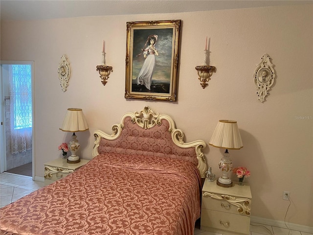 bedroom featuring light tile patterned floors