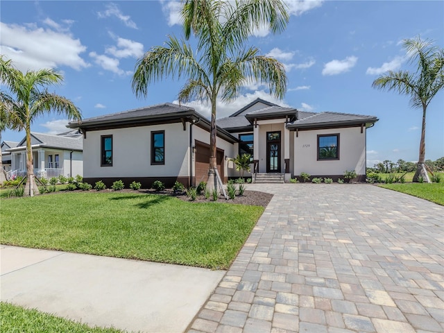 prairie-style house with a front yard