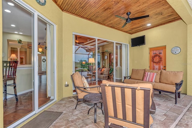 view of patio featuring outdoor lounge area and ceiling fan