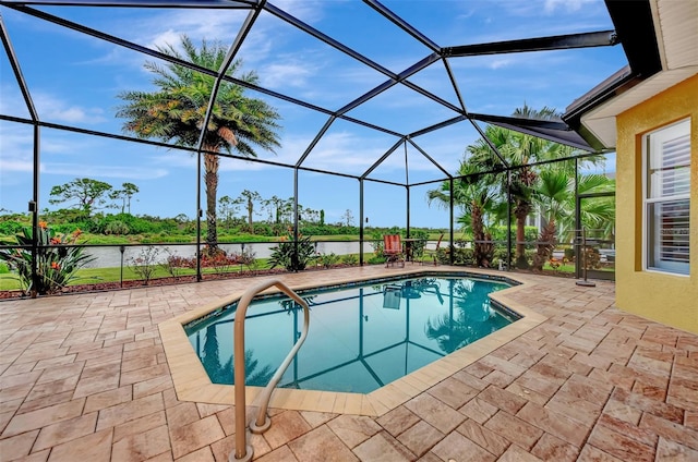 view of swimming pool with a water view, a lanai, and a patio area