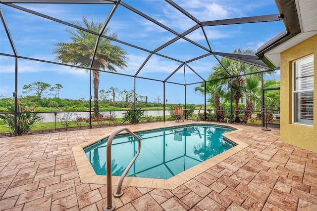 view of swimming pool with a patio, a water view, and glass enclosure