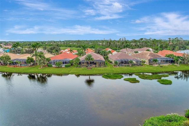 drone / aerial view with a water view