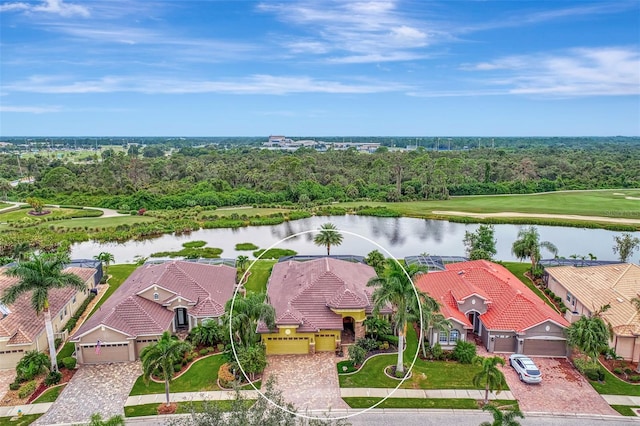 bird's eye view with a water view