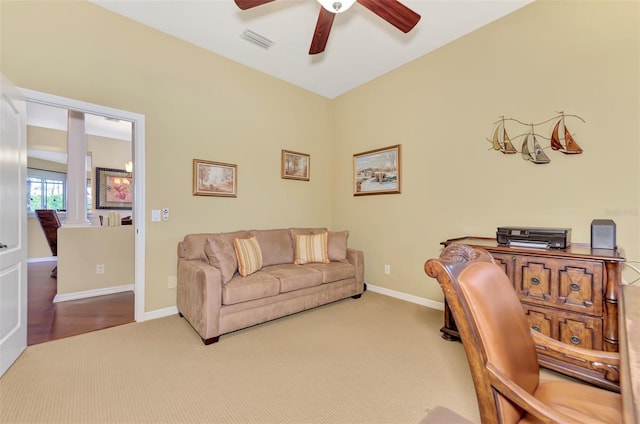 office with ceiling fan and carpet