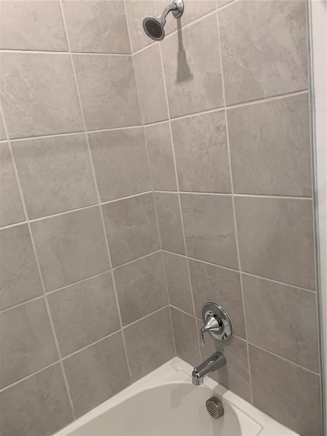 details with tiled shower / bath