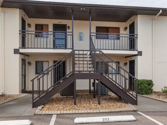 view of property with central AC unit