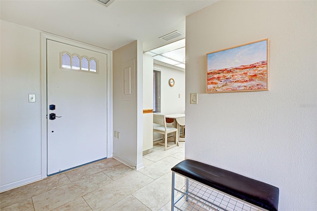 entrance foyer with light tile patterned flooring