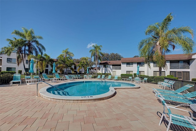 view of pool featuring a patio