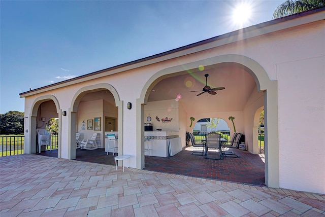 view of patio / terrace with ceiling fan