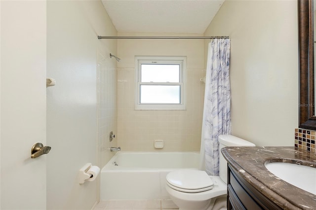 full bathroom with a textured ceiling, shower / bathtub combination with curtain, tile patterned flooring, vanity, and toilet