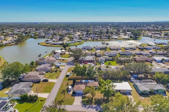 drone / aerial view with a water view