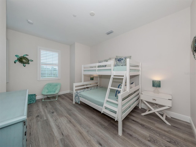 bedroom featuring wood-type flooring