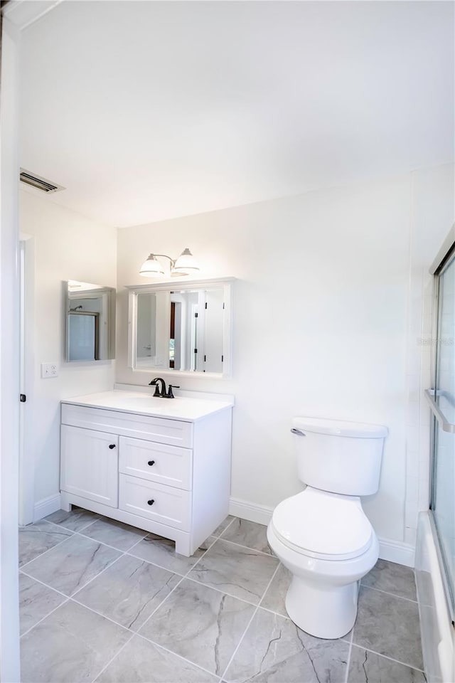 full bathroom featuring toilet, shower / bath combination with glass door, large vanity, and tile flooring