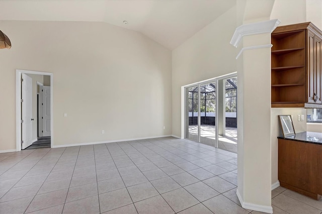 interior space featuring high vaulted ceiling