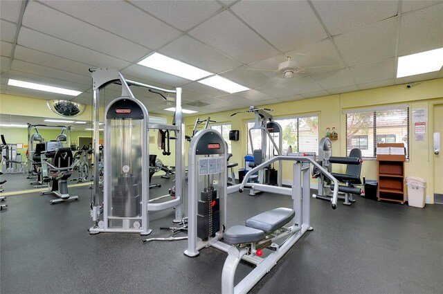 exercise room with a drop ceiling