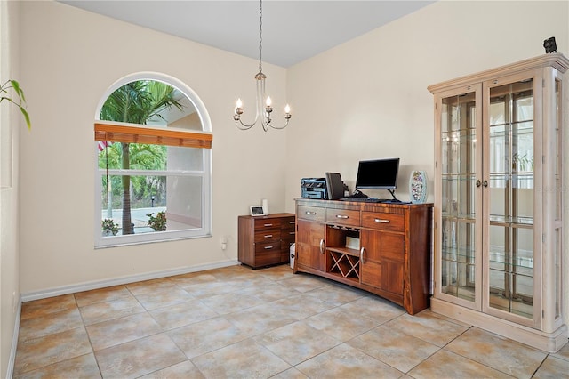 office area with light tile floors and a chandelier